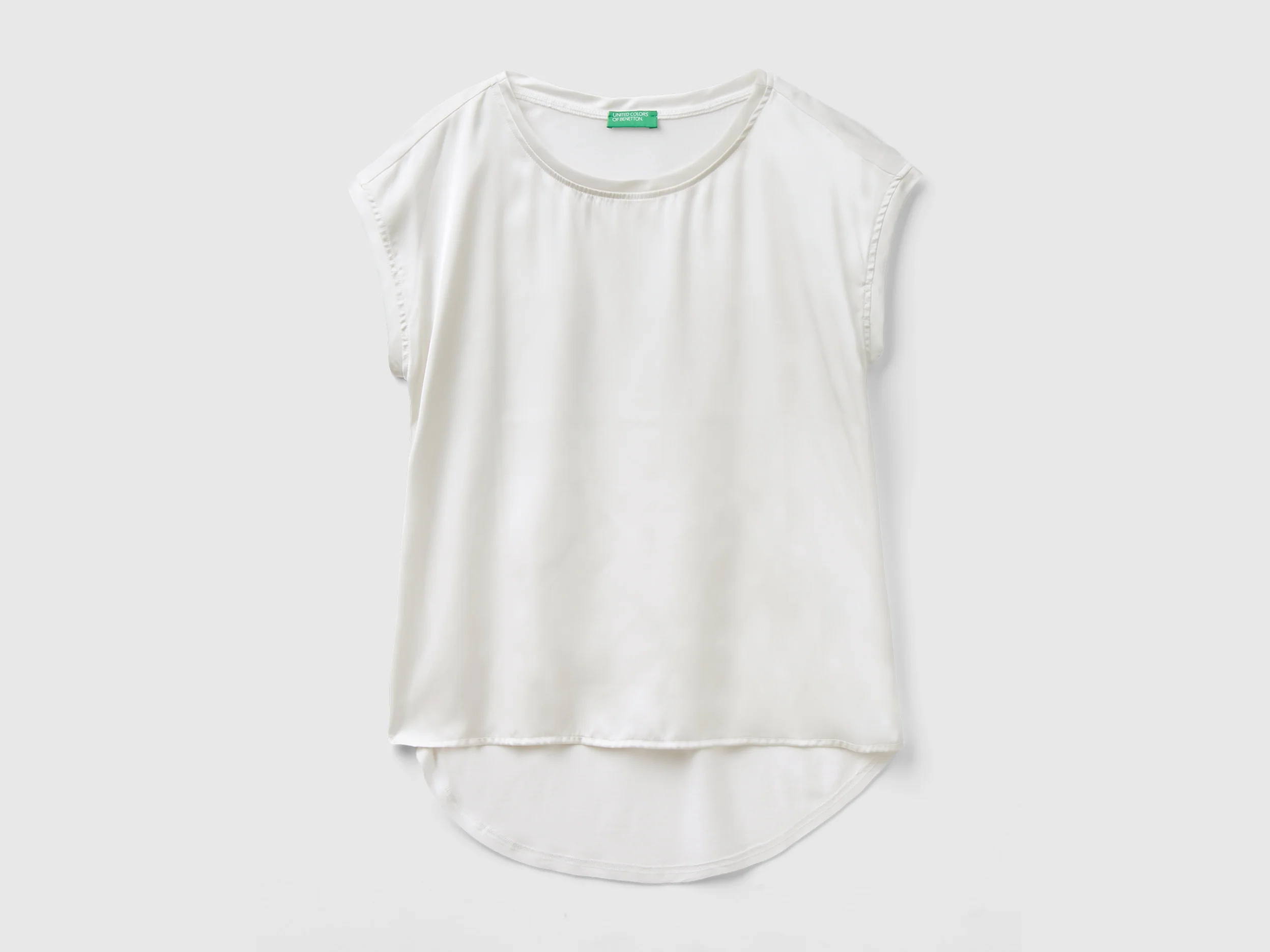 Blusa con scollo a barchetta