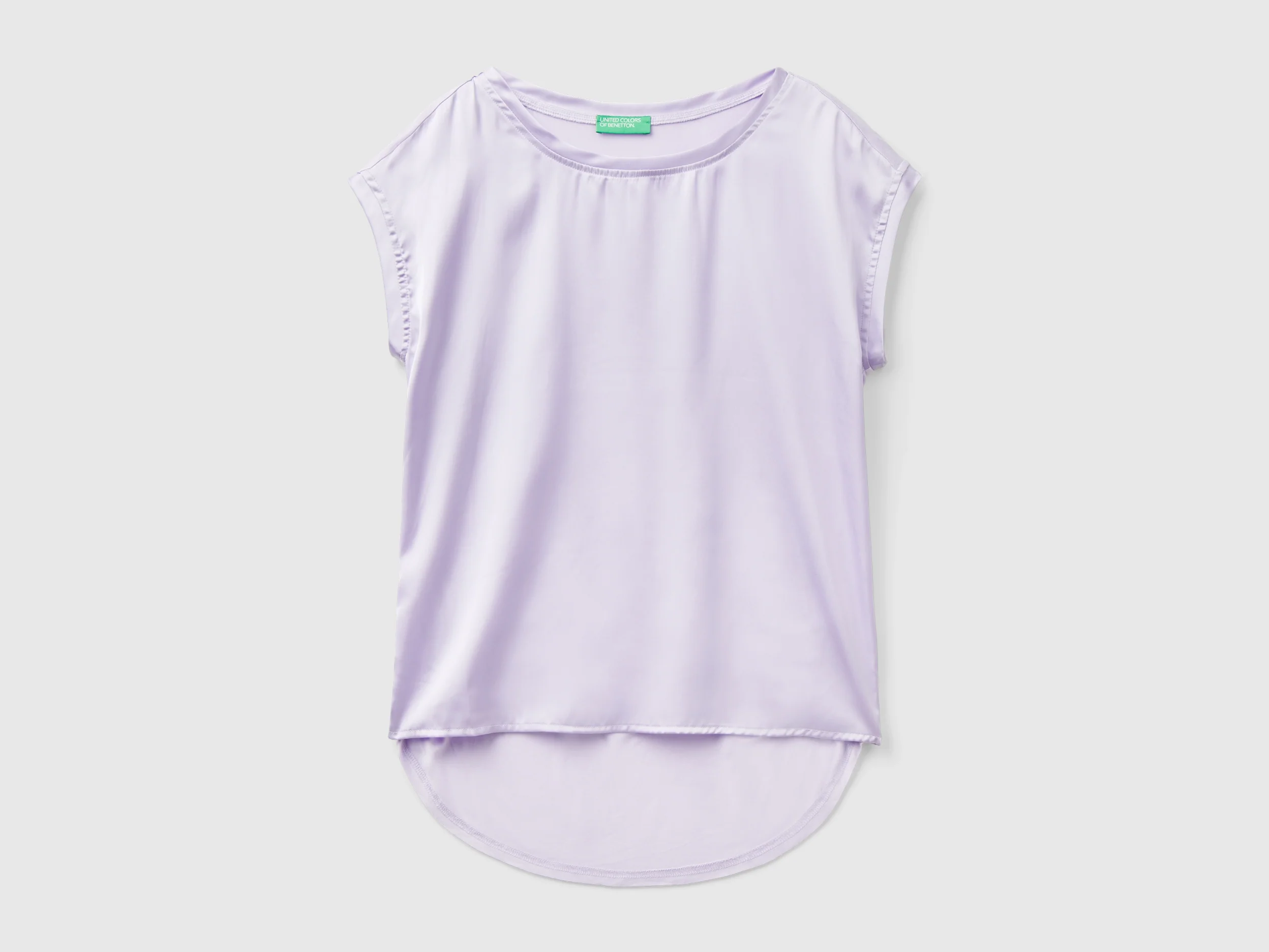 Blusa con scollo a barchetta