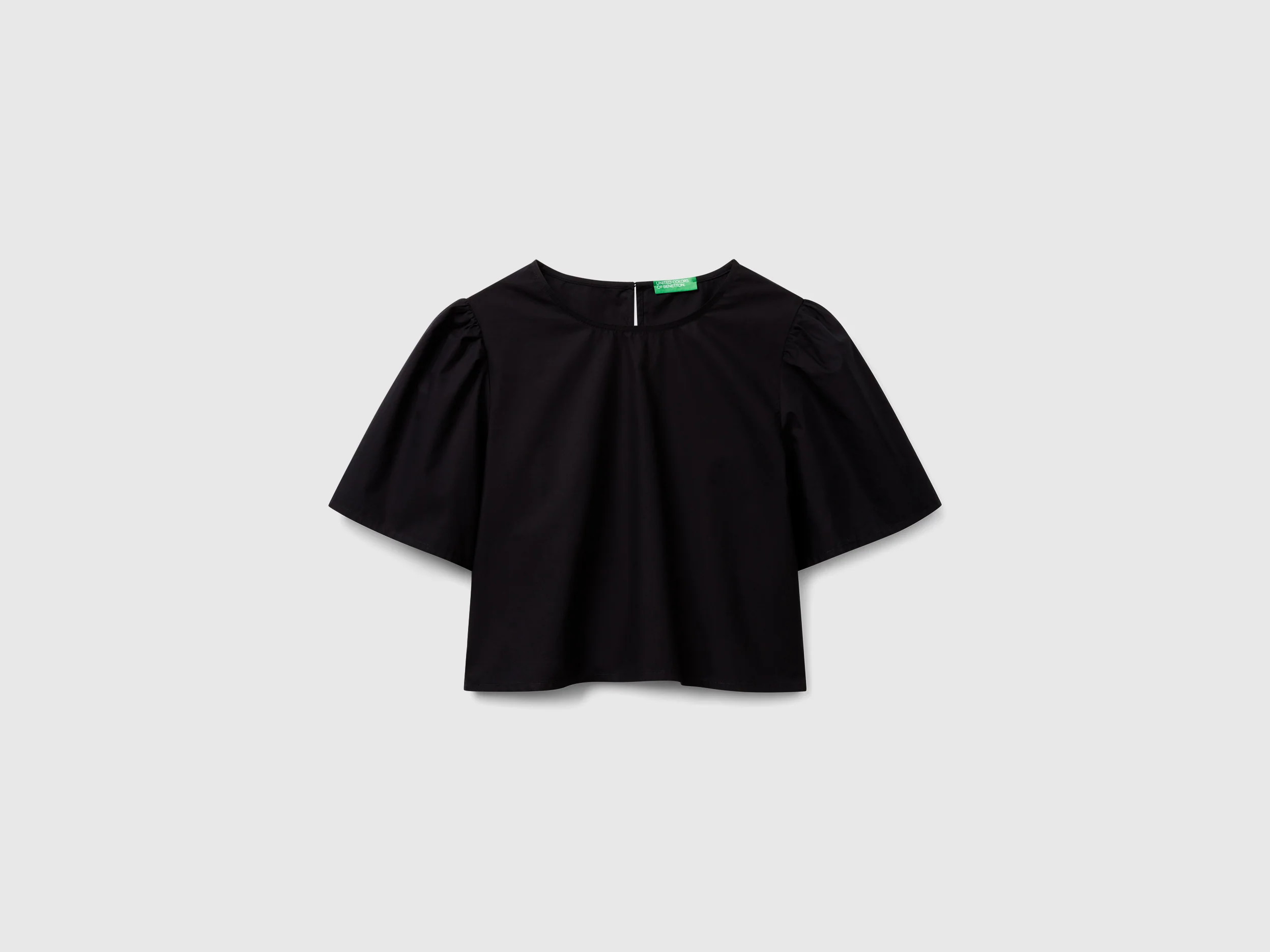 Blusa svasata con manica volant